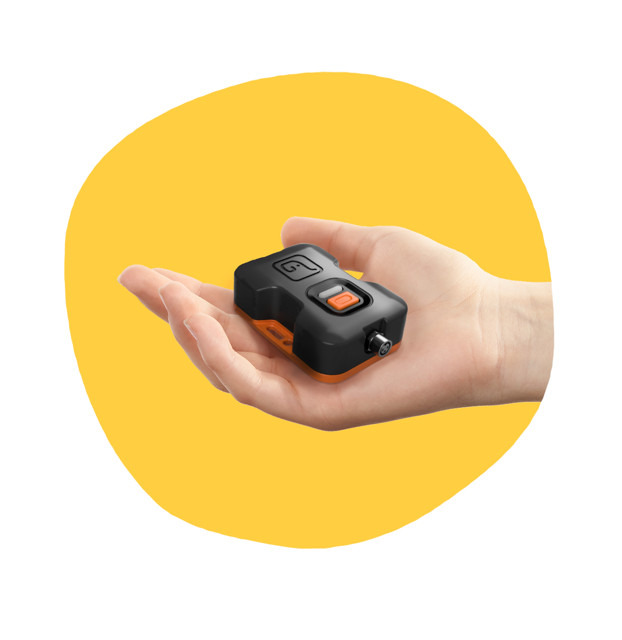 A temperature monitoring device held in a hand on a yellow background